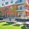 Outdoor lounge at our apartments for rent in Stamford, CT, featuring outdoor couches and tables on astroturf.
