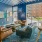 Resident lounge at our apartments for rent in Stamford, CT, featuring carpeted flooring, ample seating, and coffee tables.