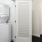 a room with white cabinets